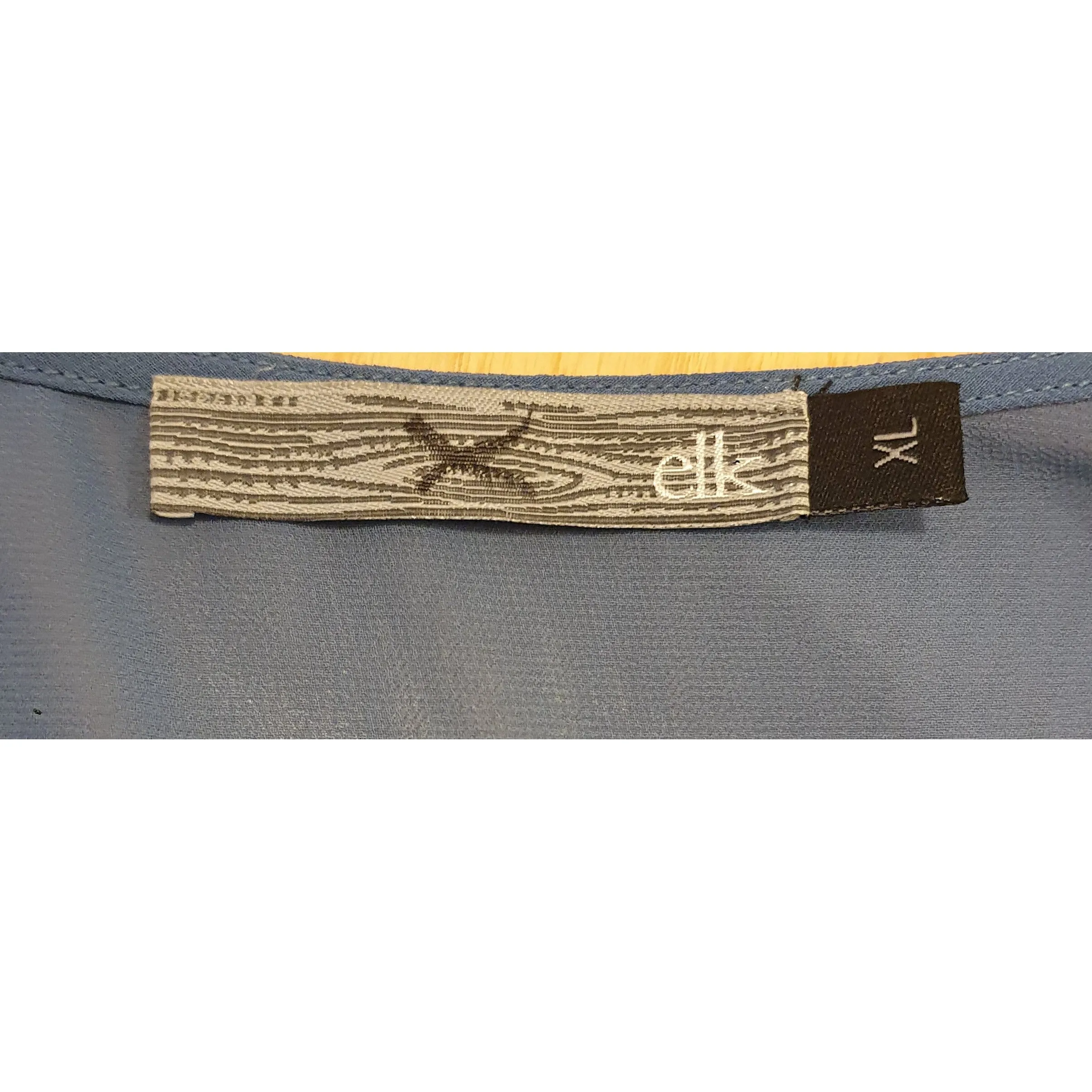 Elk blue semi-sheer top with tee shirt length sleeves size XL (best fits size 16)