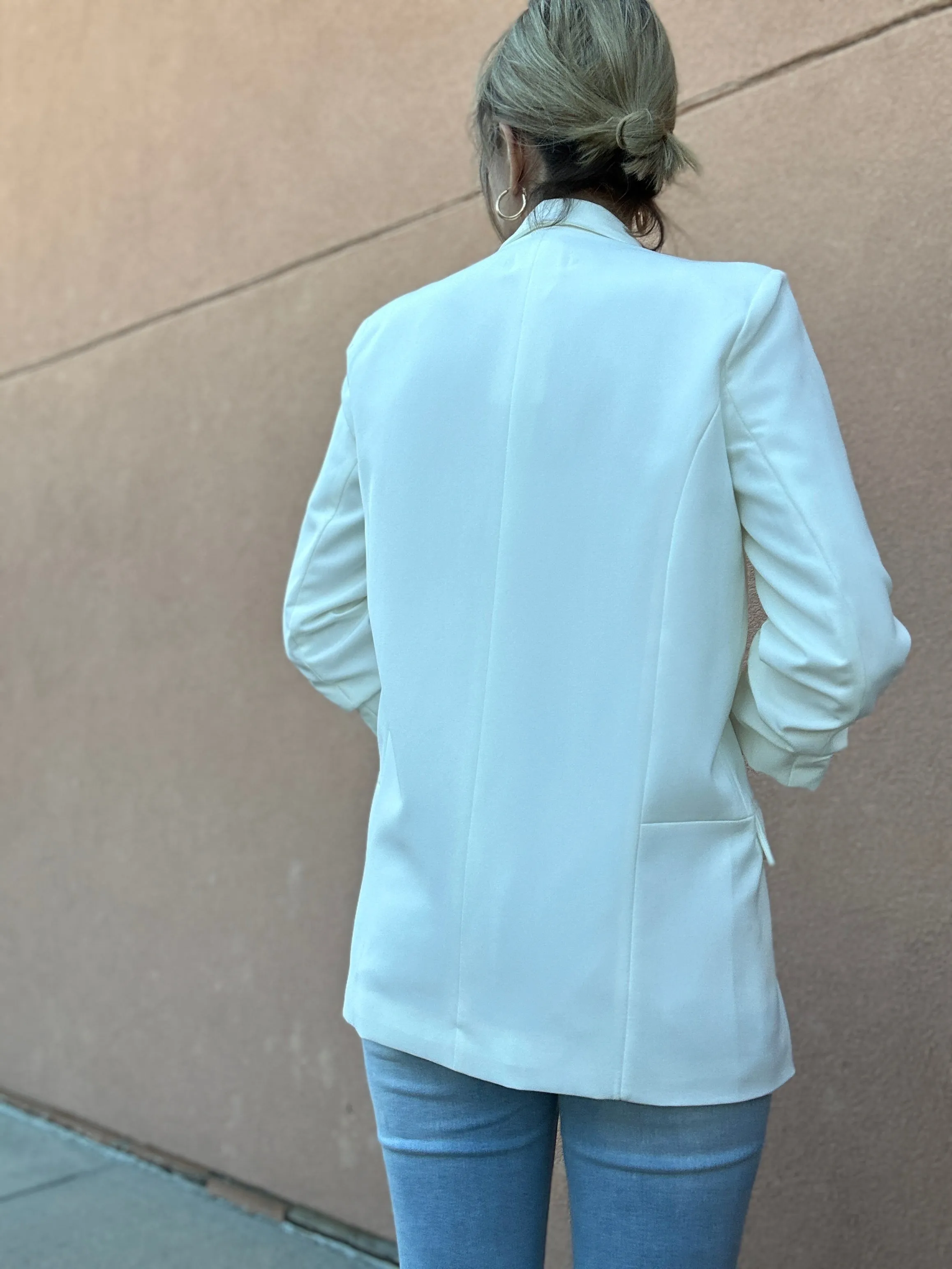 Linda’s White Blazer