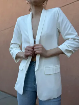 Linda’s White Blazer
